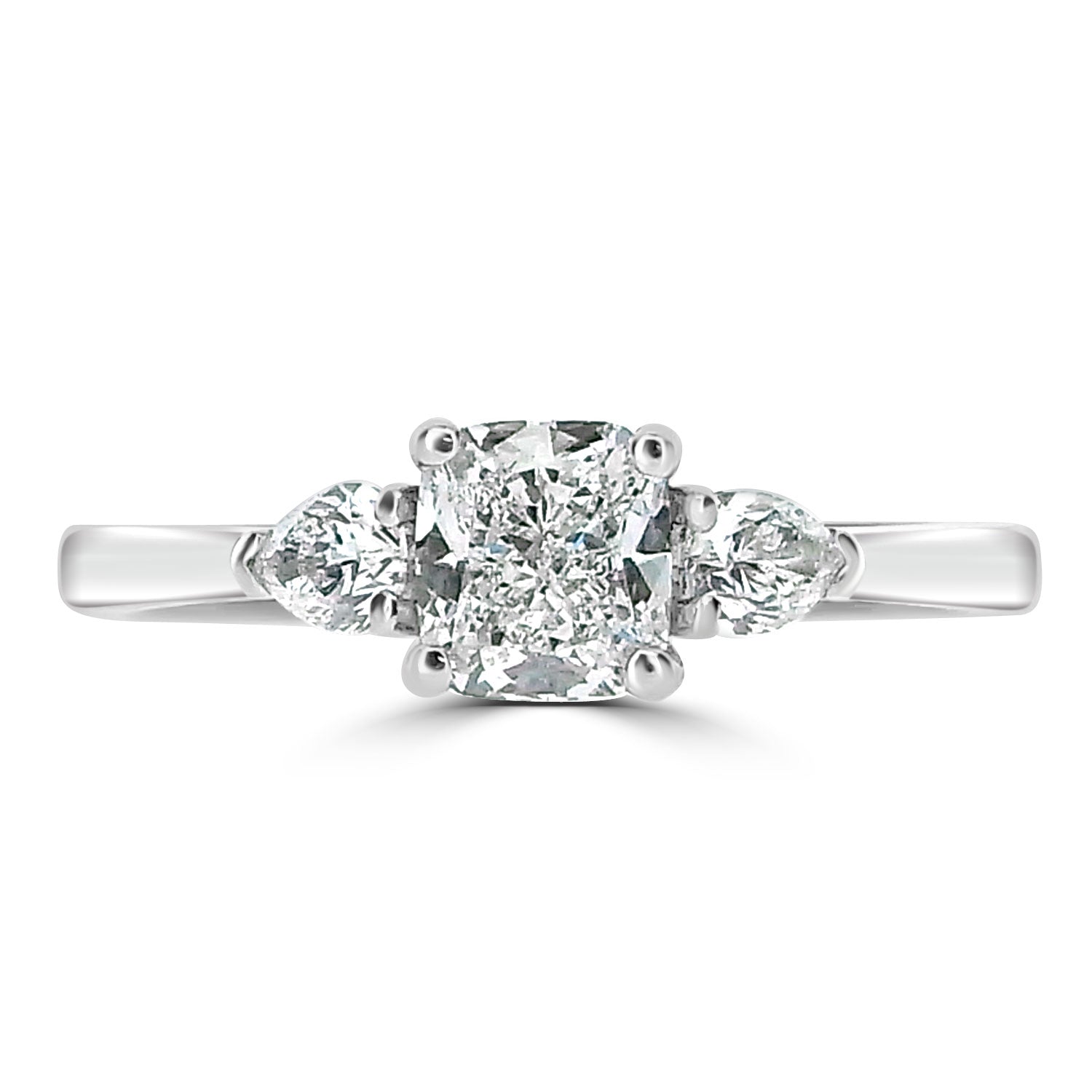 Cushion cut diamond and 2 side pear cut diamonds set on platinum from fogal and barnes fine jewellers of harrogate
