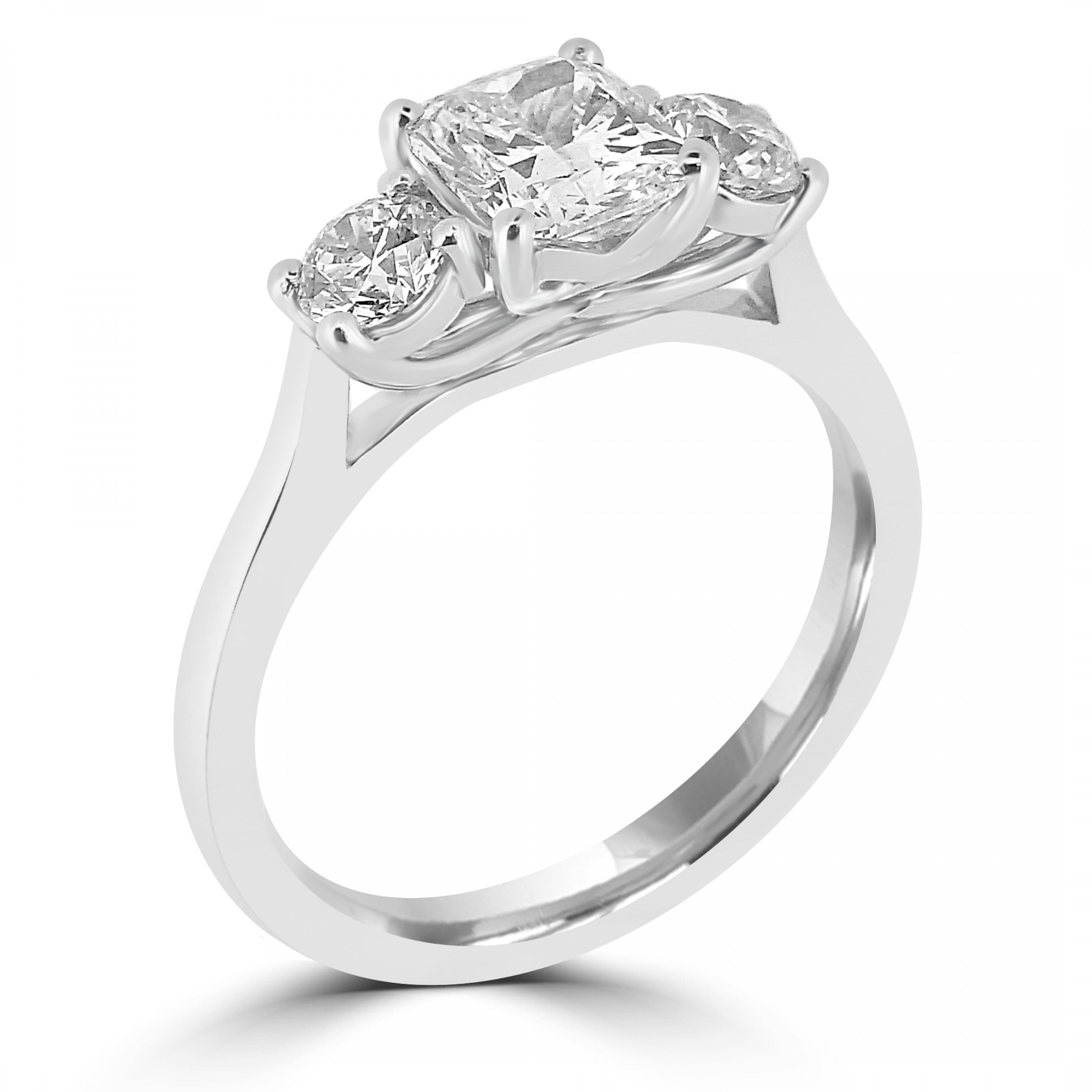 Cushion cut natural diamond trilogy engagement ring harrogate, set on 18ct white gold or platinum. Fogal and Barnes Fine Jewellers