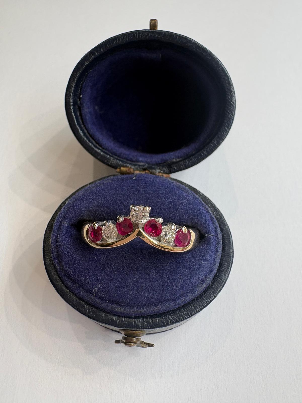 ruby and diamond wishbone ring, chevron ring ruby diamond, natural ruby ring UK, second hand wishbone ring, pre-loved ruby ring, vintage wishbone ring, 9ct gold ruby diamond ring, ruby diamond stacking ring, wishbone wedding ring, second hand jewellery Harrogate, second hand jewellery Leeds, second hand jewellery York, second hand jewellery Yorkshire, pre-owned natural ruby ring UK, natural diamond wishbone ring, unique ruby ring, buy second hand wishbone ring, wishbone ring size N, ruby ring near me, fine
