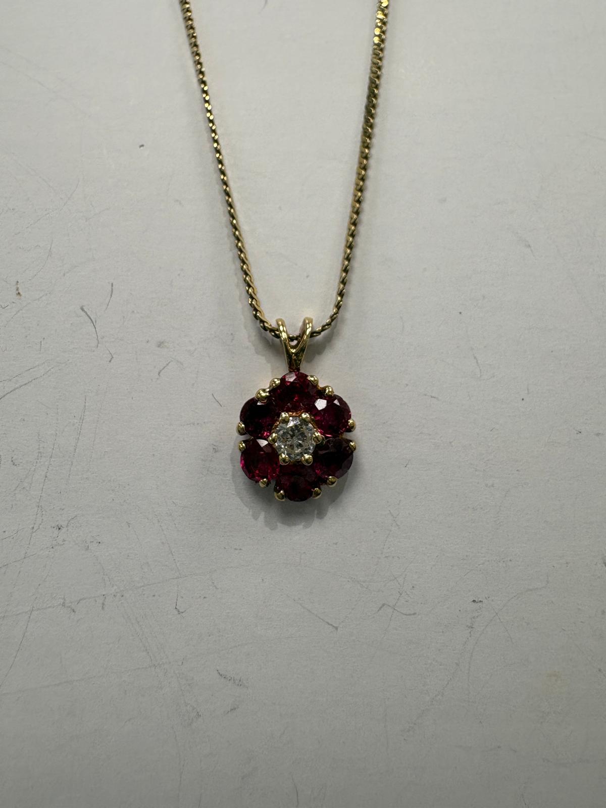 14k yellow gold ruby flower pendant second hand jewellery fogal and barnes