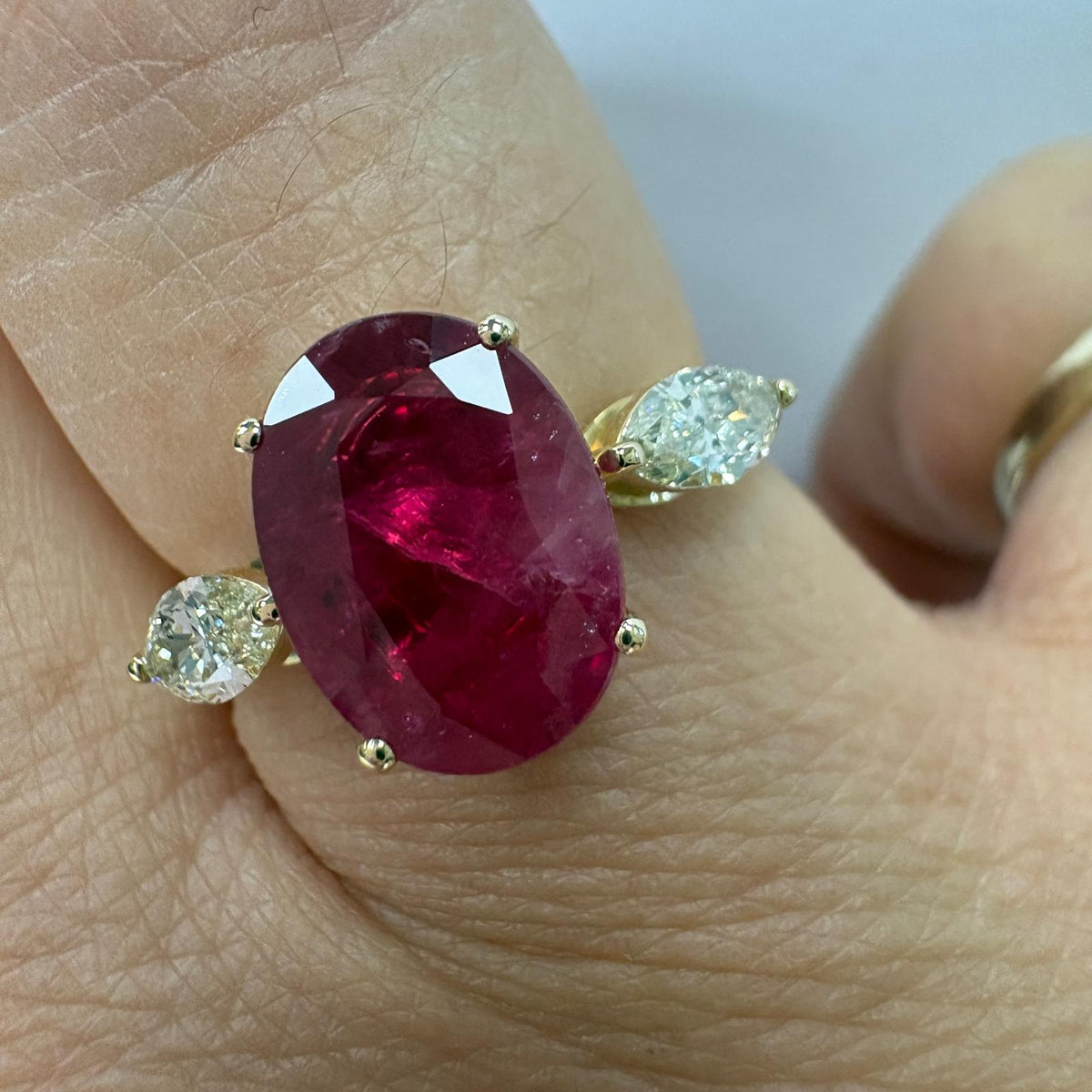ruby and diamond ring, 3 carat ruby ring, oval ruby ring UK, marquise diamond ring, east west marquise ring, ruby engagement ring, ruby anniversary ring, 18ct gold ruby ring