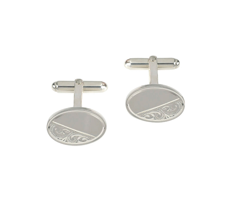 Sterling silver oval cufflinks with intricate vintage-style engraving, polished finish – Fogal & Barnes Fine Jewellers of Harrogate.