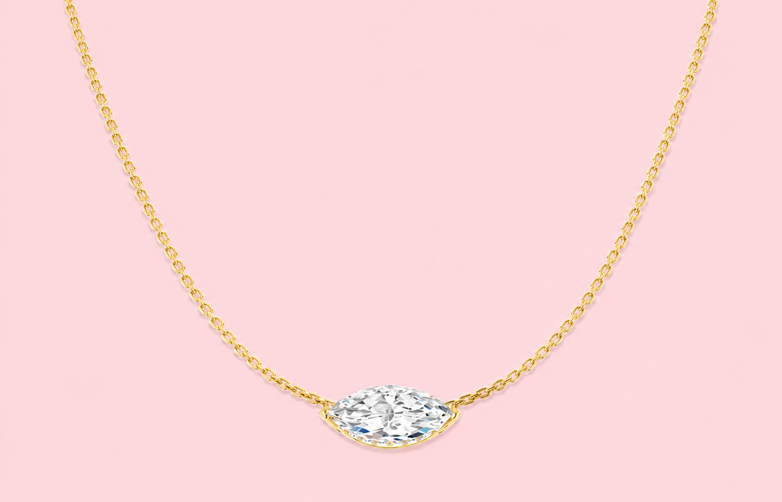 Lab grown marquise diamond pendant necklace with hidden halo of round brilliant diamonds shown in yellow gold and white gold versions on a pink background