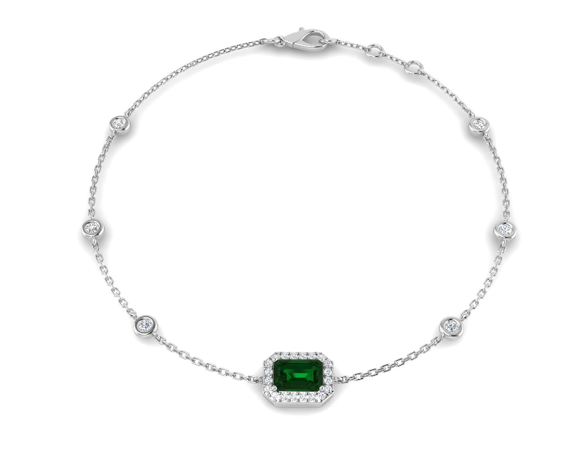 1.36CT EMERALD AND DIAMOND HALO GOLD TENNIS BRACELET