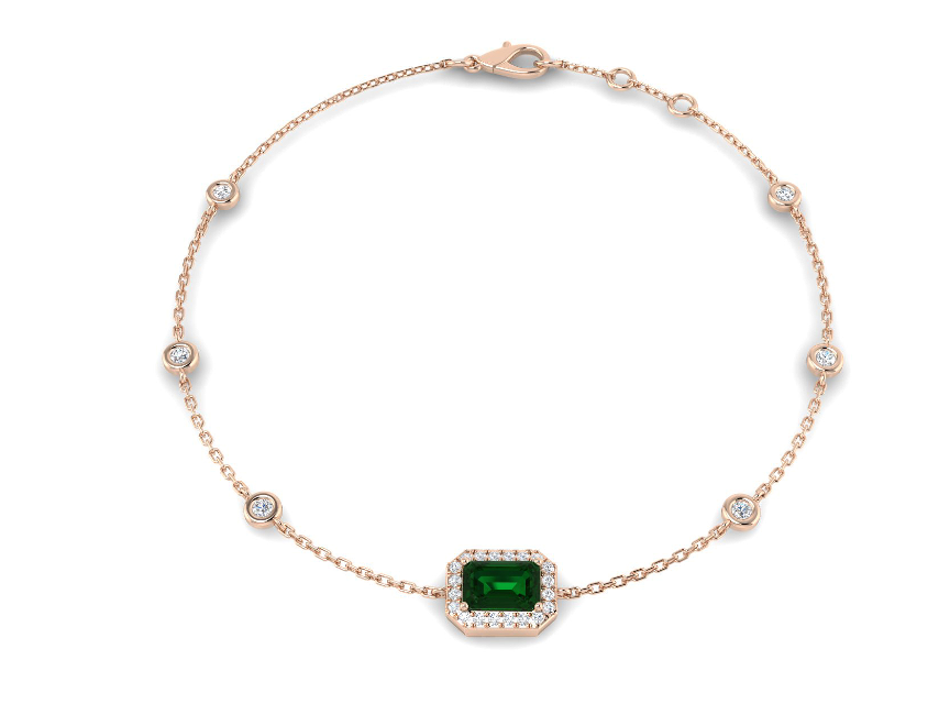 1.36CT EMERALD AND DIAMOND HALO GOLD TENNIS BRACELET
