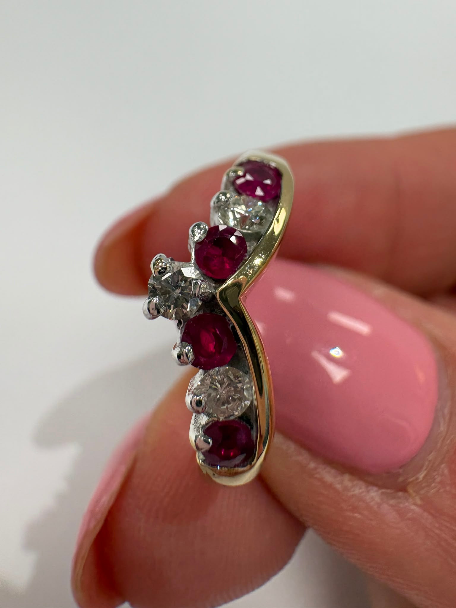 ruby and diamond wishbone ring, chevron ring ruby diamond, natural ruby ring UK, second hand wishbone ring, pre-loved ruby ring, vintage wishbone ring, 9ct gold ruby diamond ring, ruby diamond stacking ring, wishbone wedding ring, second hand jewellery Harrogate, second hand jewellery Leeds, second hand jewellery York, second hand jewellery Yorkshire, pre-owned natural ruby ring UK, natural diamond wishbone ring, unique ruby ring, buy second hand wishbone ring, wishbone ring size N, ruby ring near me, fine