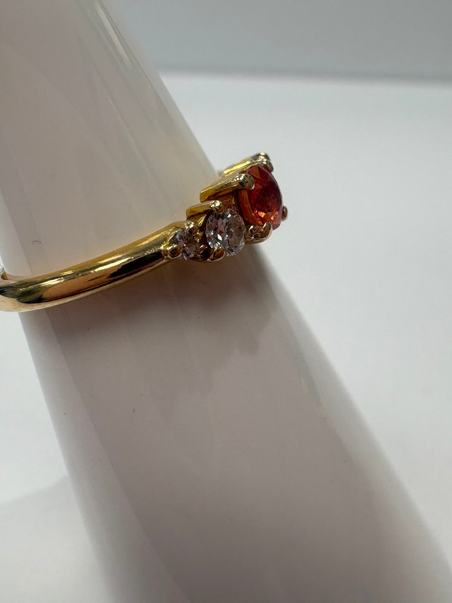 orange sapphire ring, moissanite ring 18ct gold, pre-loved coloured gemstone ring, second hand sapphire ring Harrogate, five stone gemstone ring Yorkshire