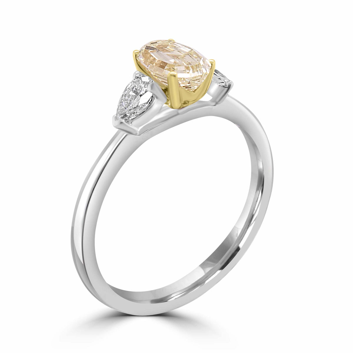 champagne diamond engagement ring, oval champagne diamond ring, three stone diamond ring, IGI certified diamond ring, platinum yellow gold engagement ring, natural fancy colour diamond ring UK