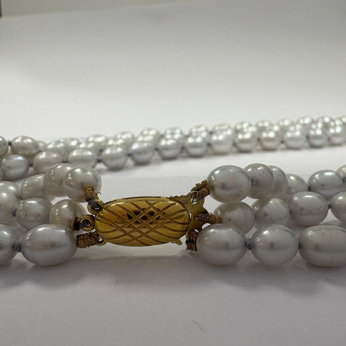 grey pearl necklace, triple strand pearl necklace, freshwater pearl necklace UK, multi strand pearl necklace, silver grey pearls, pearl necklace gold clasp, pre-loved pearl necklace, statement pearl necklace