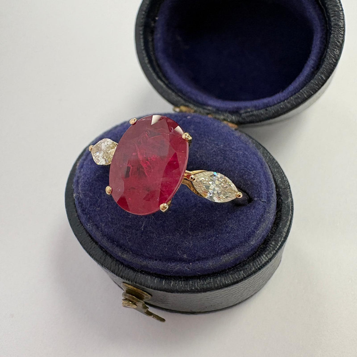 ruby and diamond ring, 3 carat ruby ring, oval ruby ring UK, marquise diamond ring, east west marquise ring, ruby engagement ring, ruby anniversary ring, 18ct gold ruby ring