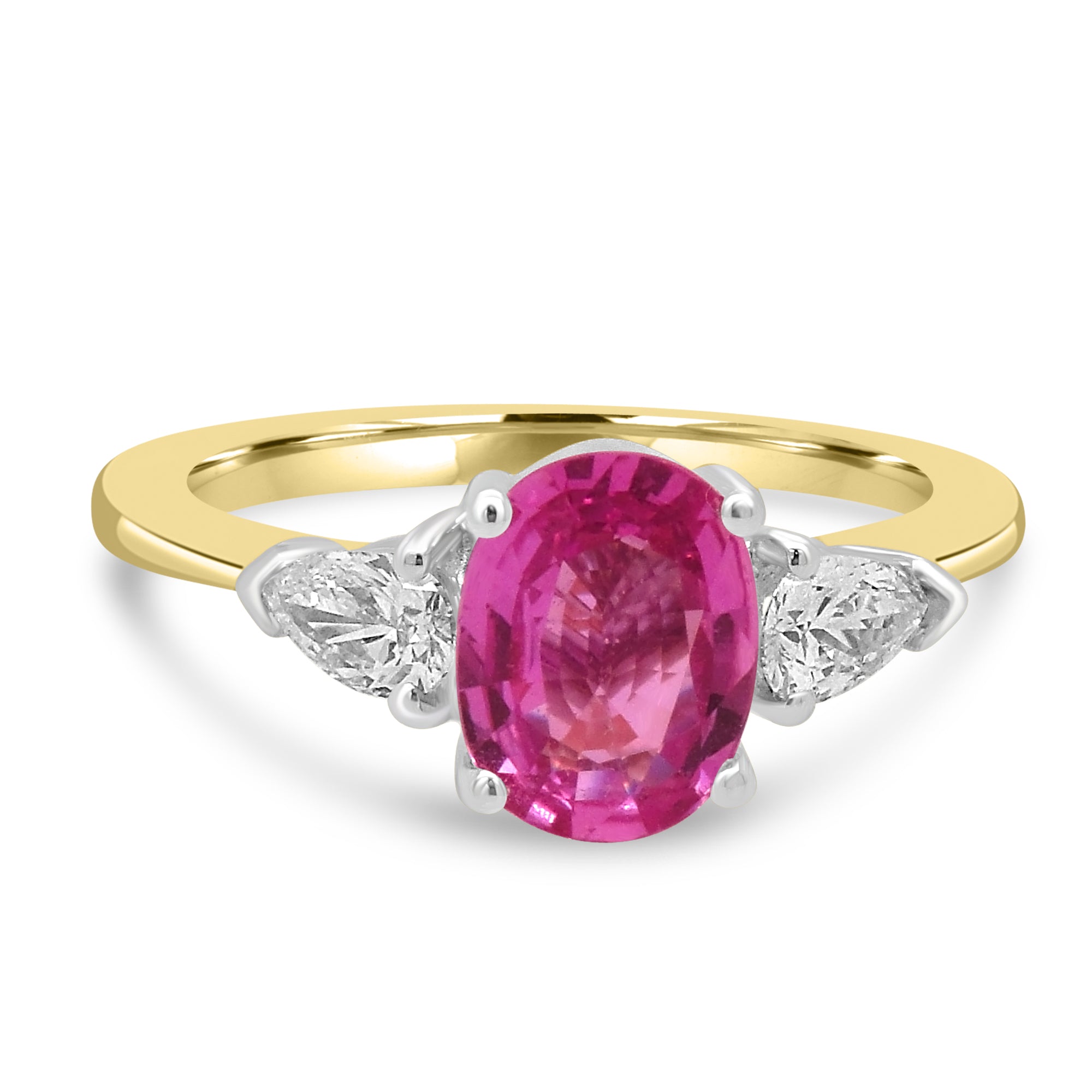 oval pink sapphire and diamond three stone engagement ring. set on 18k white and yellow gold from Fogal and Barnes fine jewellers of Harrogate.