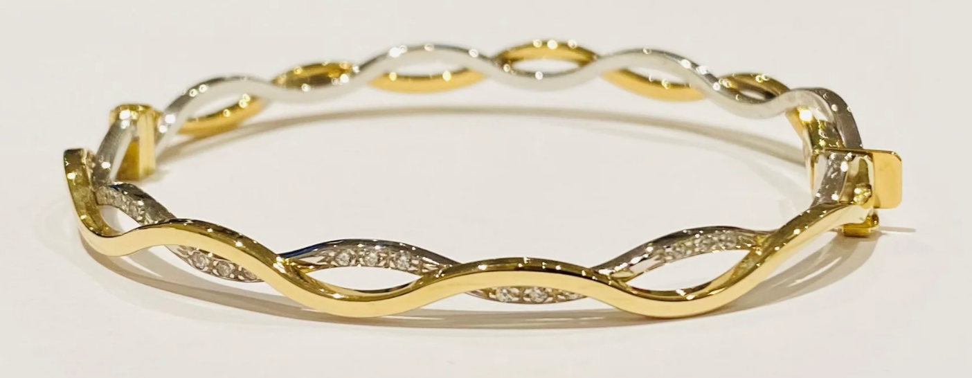 9ct yellow and white gold twisted bangle with diamond detailing hand-crafted by Fogal & Barnes Harrogate