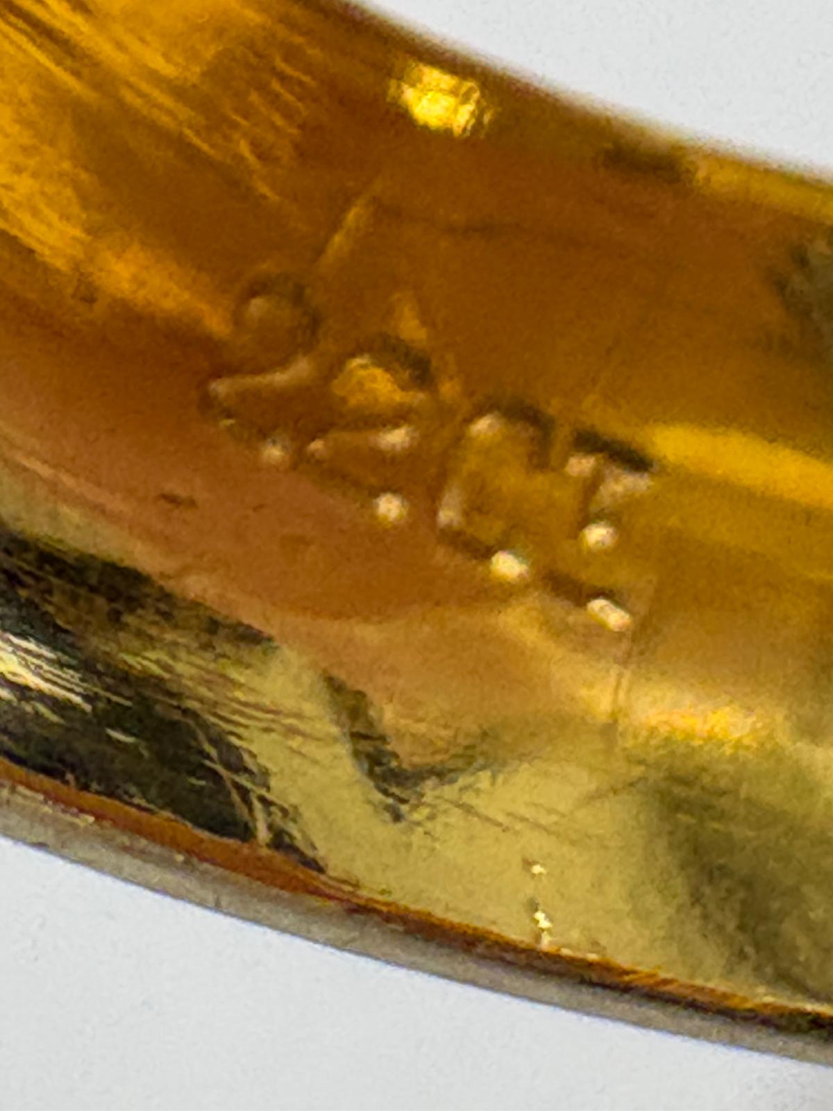 22 carat gold ring hallmark close-up