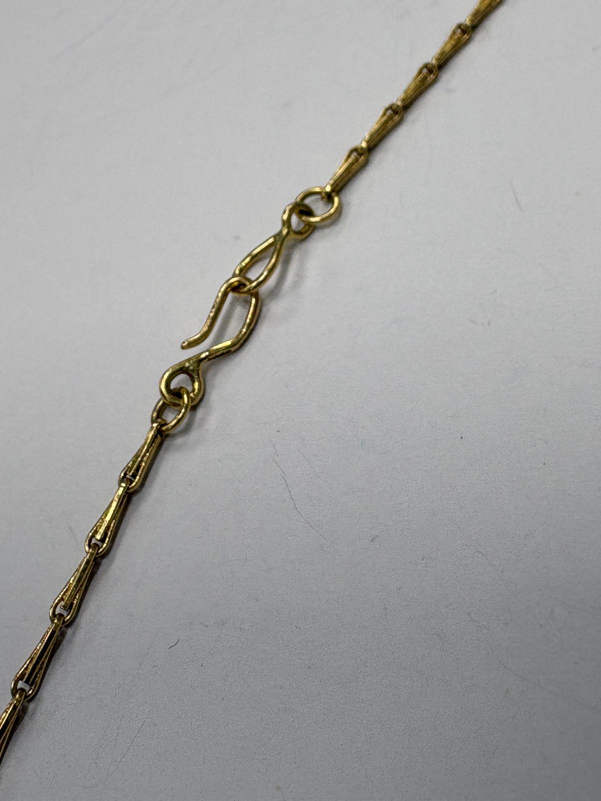 18ct yellow gold Jerusalem Cross pendant and chain shown on neck, 44cm