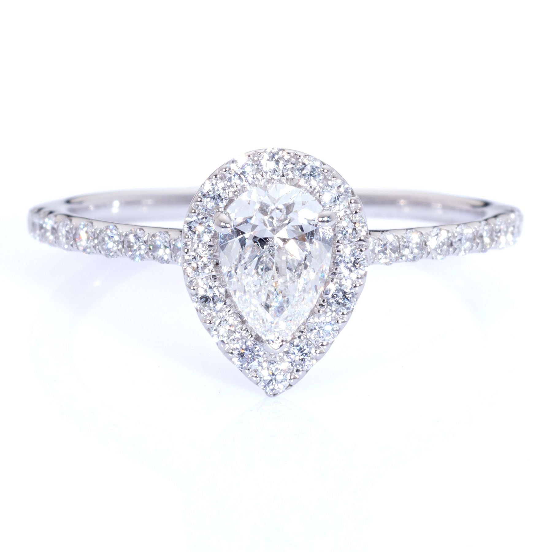 Pear shaped diamond engagement ring diamond halo platinum Harrogate jewellers Fogal and barnes