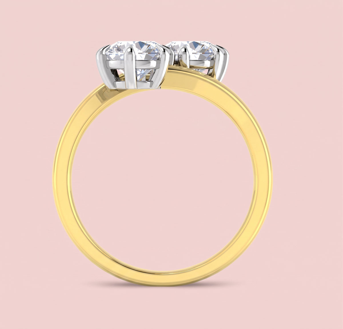 Toi et moi lab grown diamond ring in yellow gold with two round diamonds side profile view.