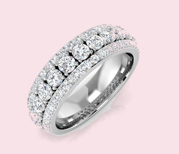 The Aurora round lab-grown diamond half eternity ring in white gold, with a row of graduated claw set diamonds between two rows of pavé diamonds