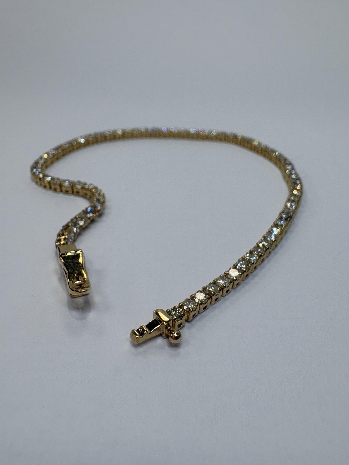 diamond tennis bracelet, pre-loved 14ct gold bracelet, second hand diamond bracelet UK, luxury diamond tennis bracelet, 14ct gold diamond bracelet