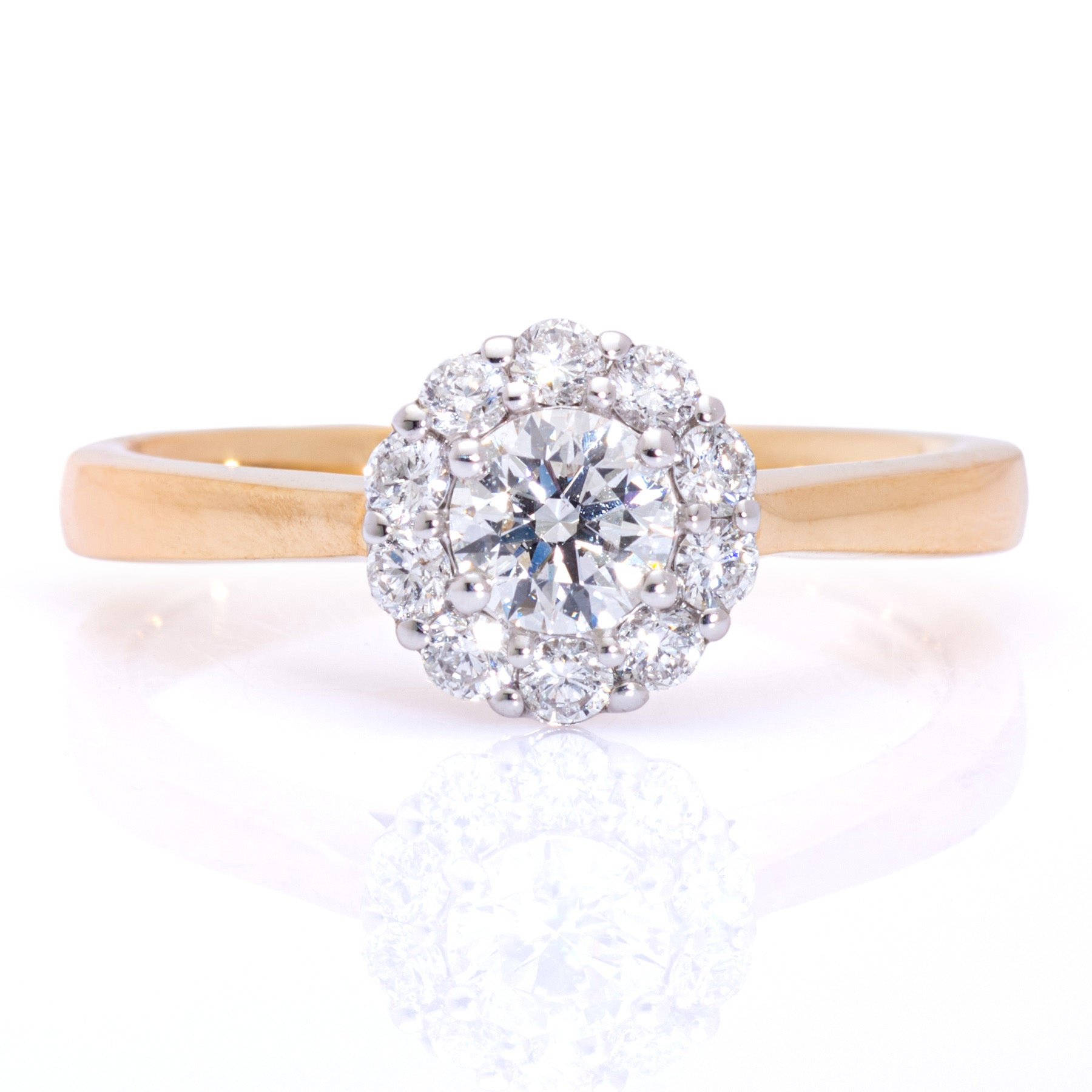 Round brilliant diamond cluster engagement ring yellow gold Harrogate jewellers Fogal and barnes