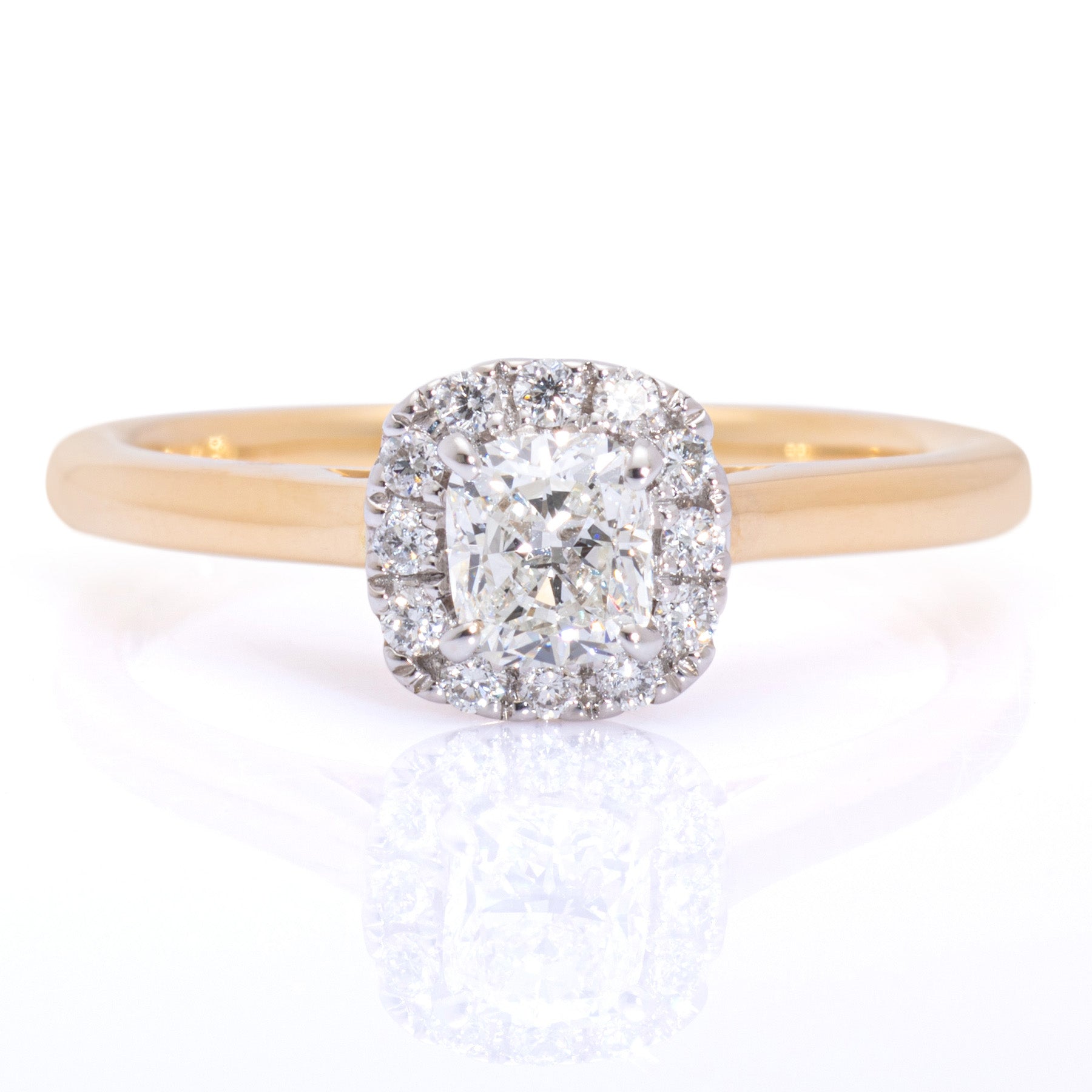 cushion cut diamond round brilliant diamond halo white gold yellow gold band harrogate jewellers fogal and barnes