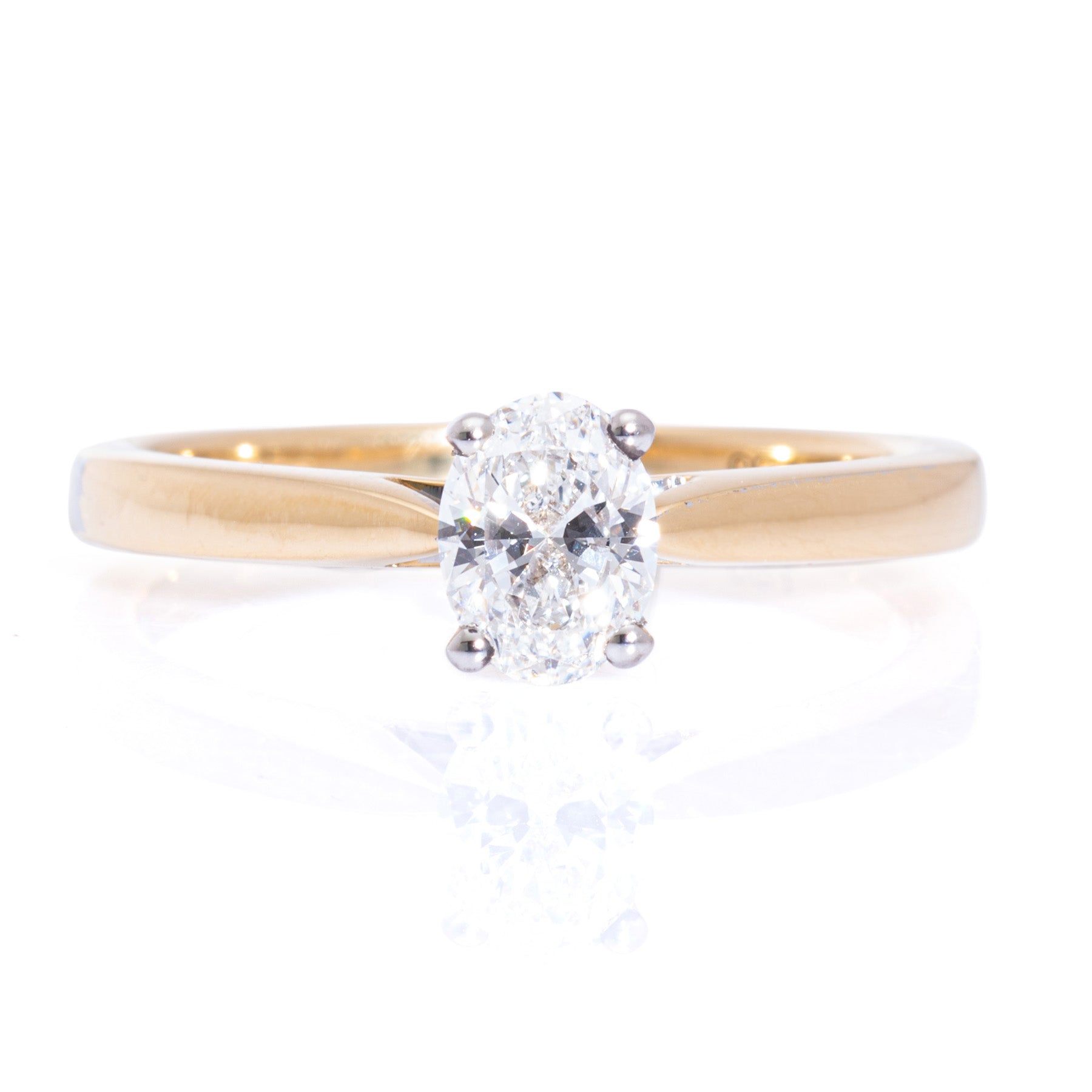 Oval cut diamond solitaire ring white gold claw setting yellow gold band harrogate jewellers fogal and barnes