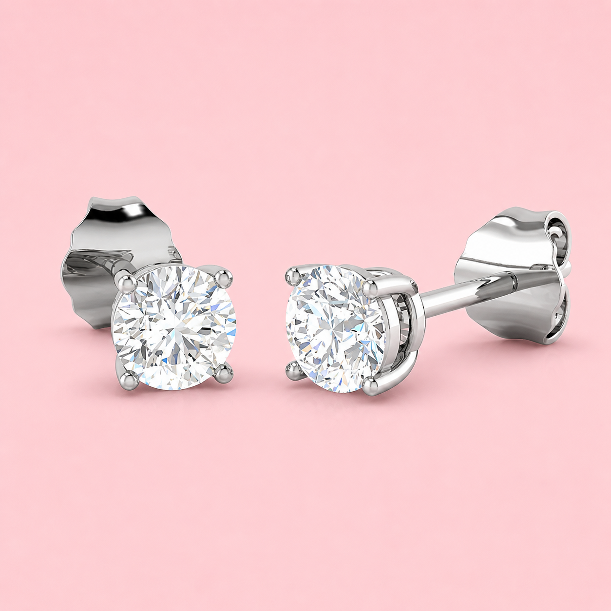 Lab-grown diamond stud earrings in 18ct white gold, round brilliant four-claw F VS, made to order at Fogal & Barnes Harrogate