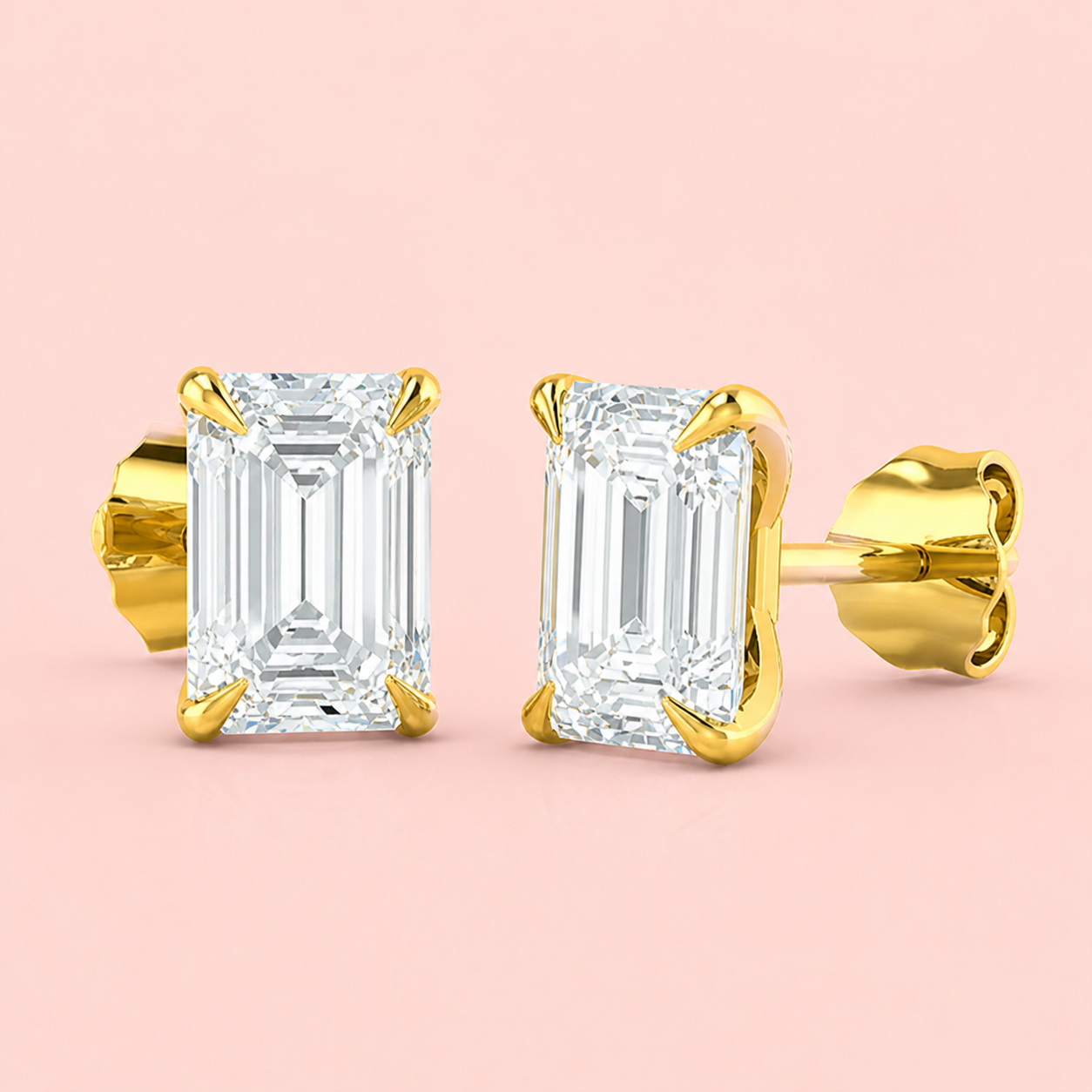 Lab-grown emerald cut diamond stud earrings in 18ct yellow gold, four-claw F VS, 2.07ct total, made to order at Fogal & Barnes Harrogate