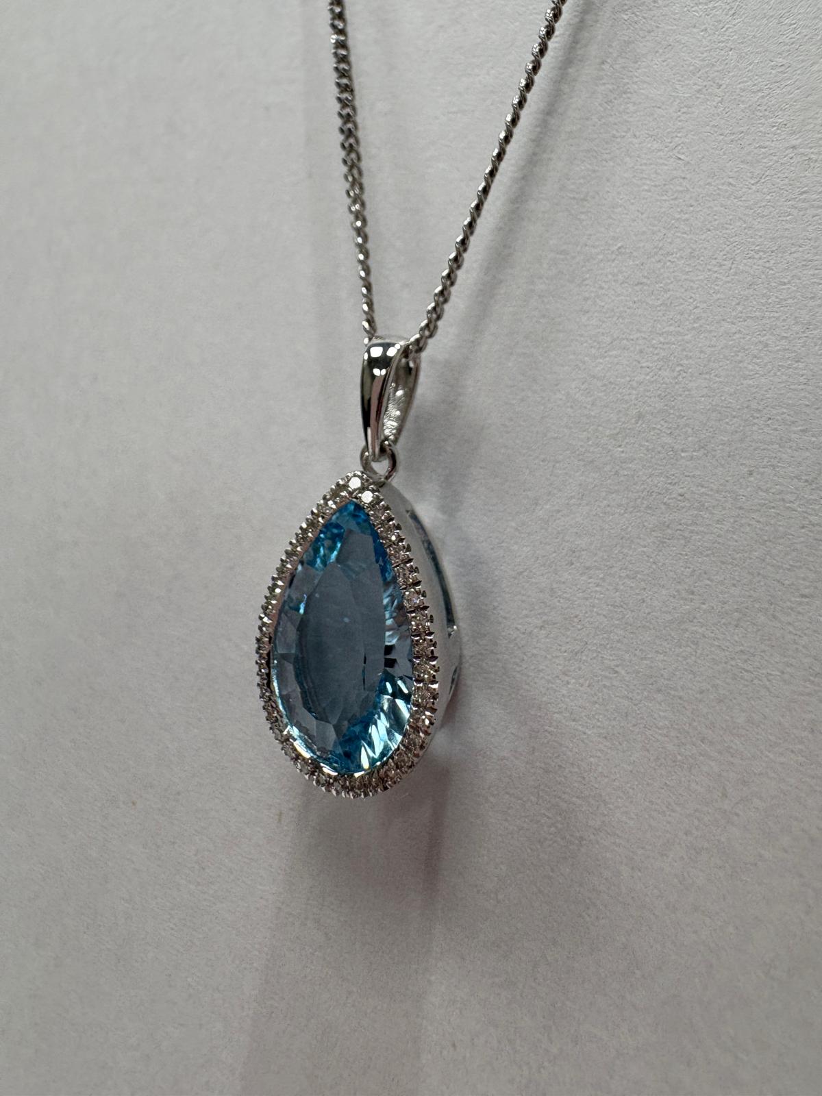 blue topaz diamond pendant, pre-loved white gold necklace, second hand 9ct white gold pendant, topaz halo pendant UK, pre-owned diamond necklace