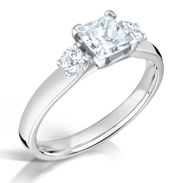 Princess cut diamond Trilogy enagement ring harrogate set with round brilliant diamonds on the side and a platinum or 18ct white gold band. Fogal and Barnes Fine Jewellers of Harrogate