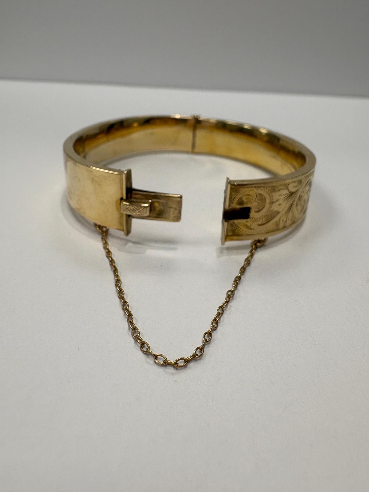 pre-loved gold bangle, vintage engraved bangle, second hand 9ct gold bangle UK, antique style hinged bangle, pre-owned gold jewellery, Victorian style bangle, vintage bangle for sale UK, second hand fine jewellery UK, hand engraved gold bangle