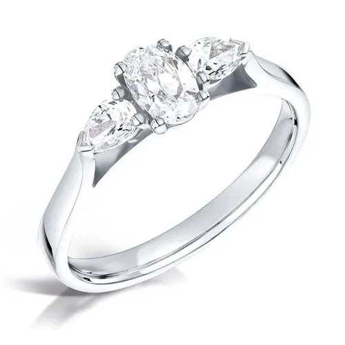 Oval cut diamond and pear three stone engagement ring set 18k white gold from fogal and barnes in harrogate
