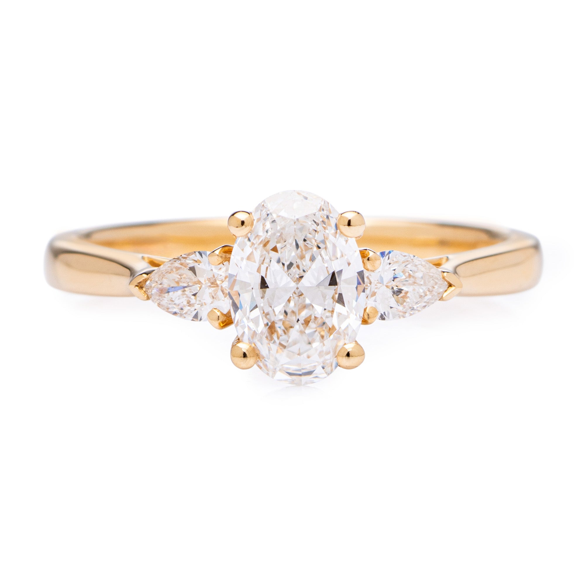 0.70CT OVAL CUT AND PEAR DIAMOND THREE STONE ENGAGEMENT RING- HARROGATE