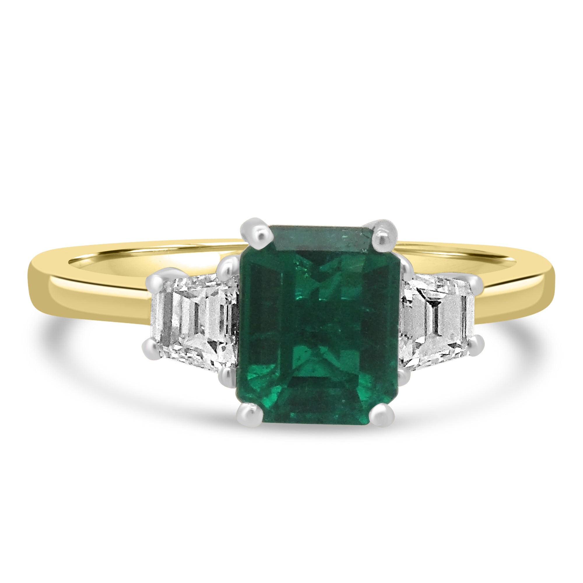 Emerald cut emerald and diamond three stone engagement ring from fogal and barnes fine jewellers of harrogate.