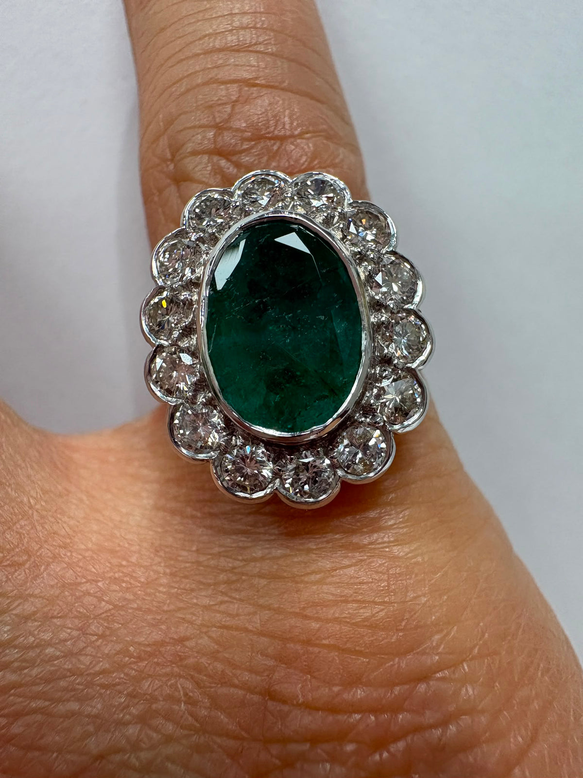Substantial emerald and diamond cluster ring, 2.40ct emerald, 0.98ct diamonds, 18ct gold, size N. Pre-loved, excellent condition. Visit our Harrogate showroom.