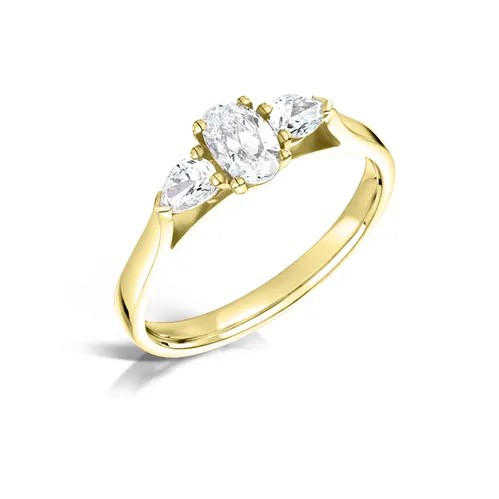 Oval cut diamond and pear three stone engagement ring set 18k yellow gold from fogal and barnes in harrogate