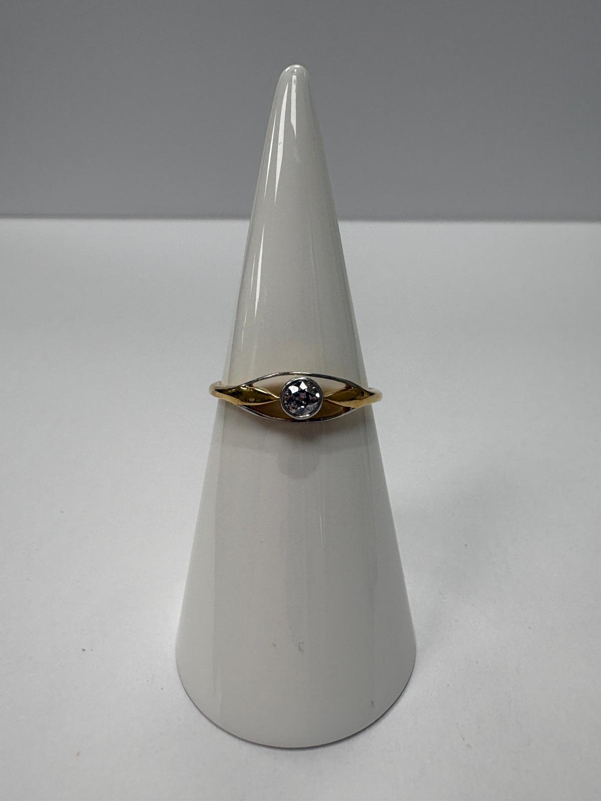 Vintage 9ct two tone yellow and white gold old cut diamond solitaire ring with open crossover shoulders, 0.15ct diamond, size N½, shown on ring cone and close up on white background, available at Fogal & Barnes Harrogate