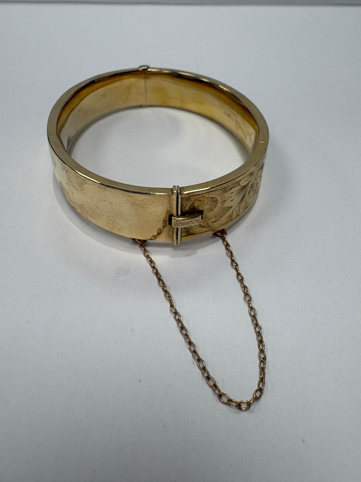 pre-loved gold bangle, vintage engraved bangle, second hand 9ct gold bangle UK, antique style hinged bangle, pre-owned gold jewellery, Victorian style bangle, vintage bangle for sale UK, second hand fine jewellery UK, hand engraved gold bangle