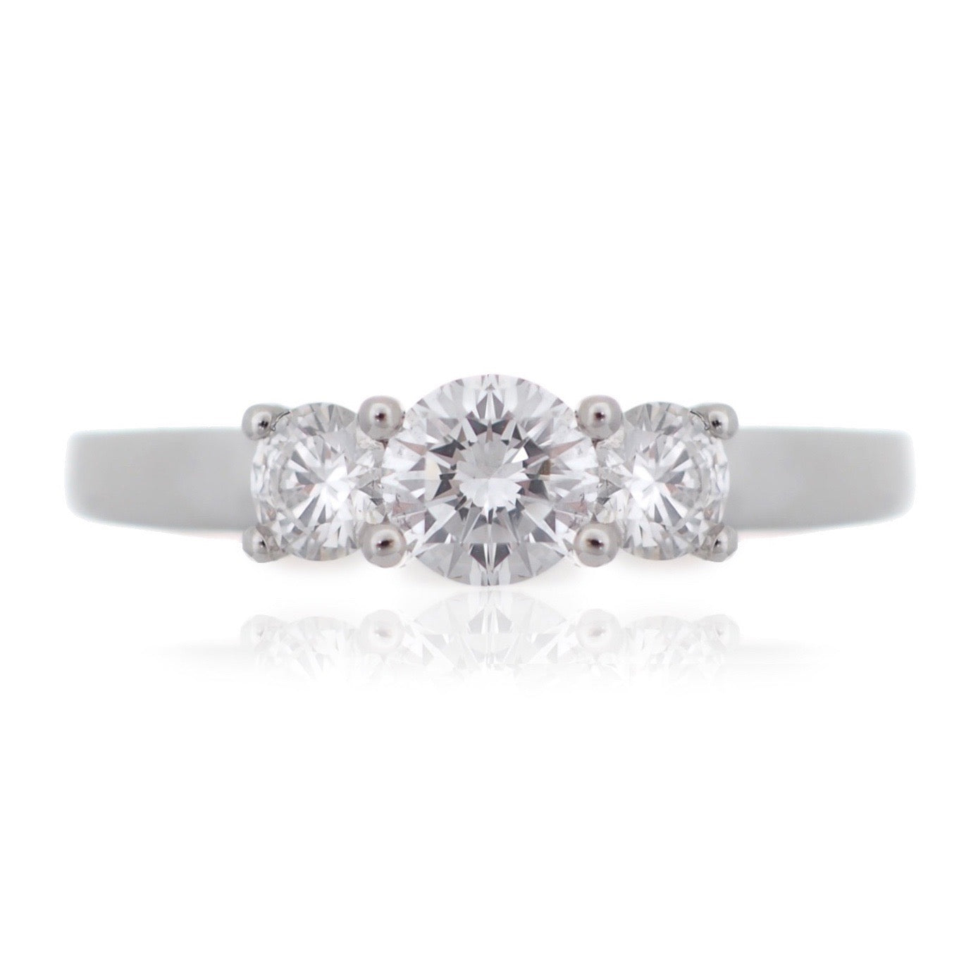 Platinum trilogy engagement ring classic round brilliant diamonds past preset and future Harrogate jewellers Fogal and barnes