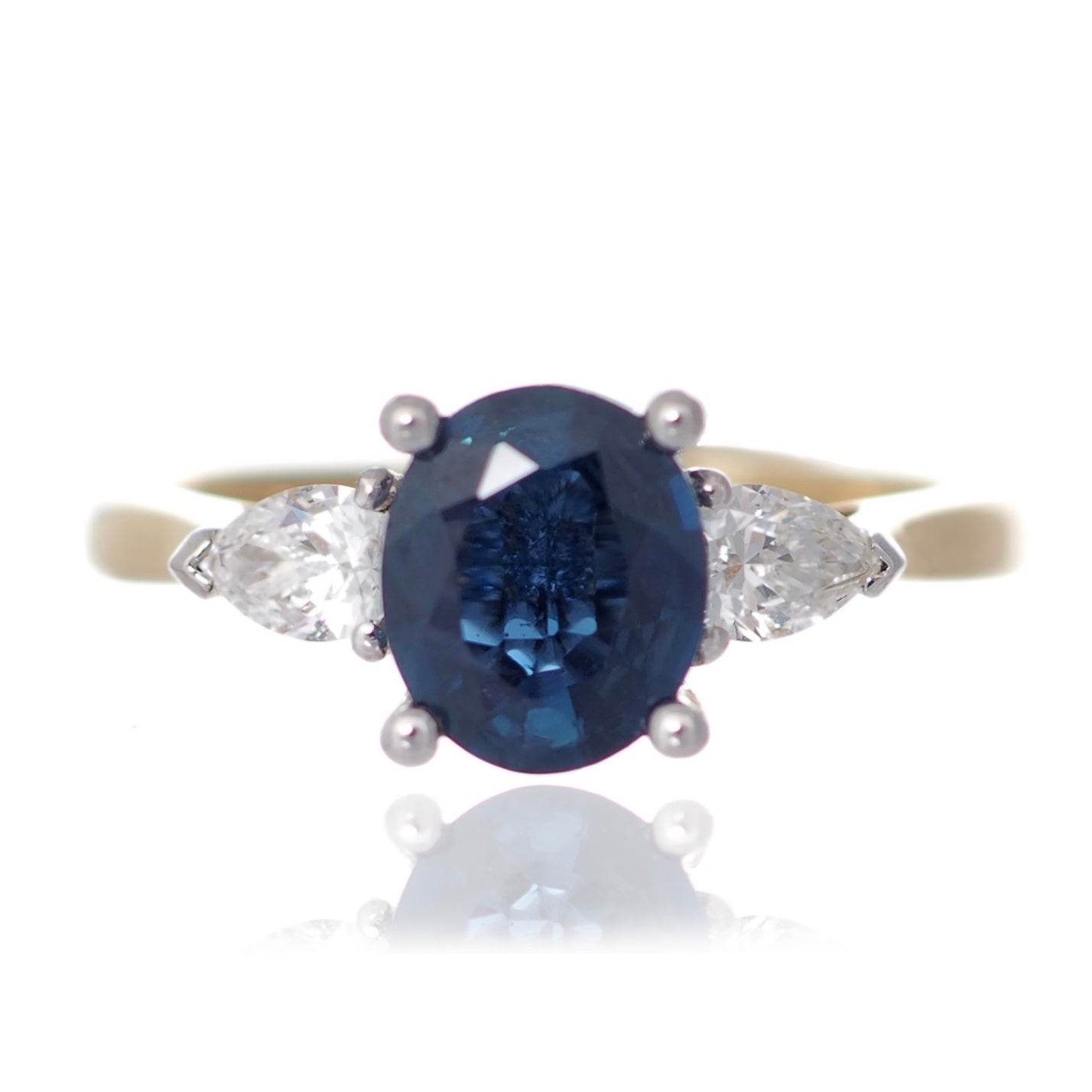 Oval Sapphire and Pear Diamond Trilogy engagement ring yellow gold Platinum Harrogate Jewellers Fogal and Barnes