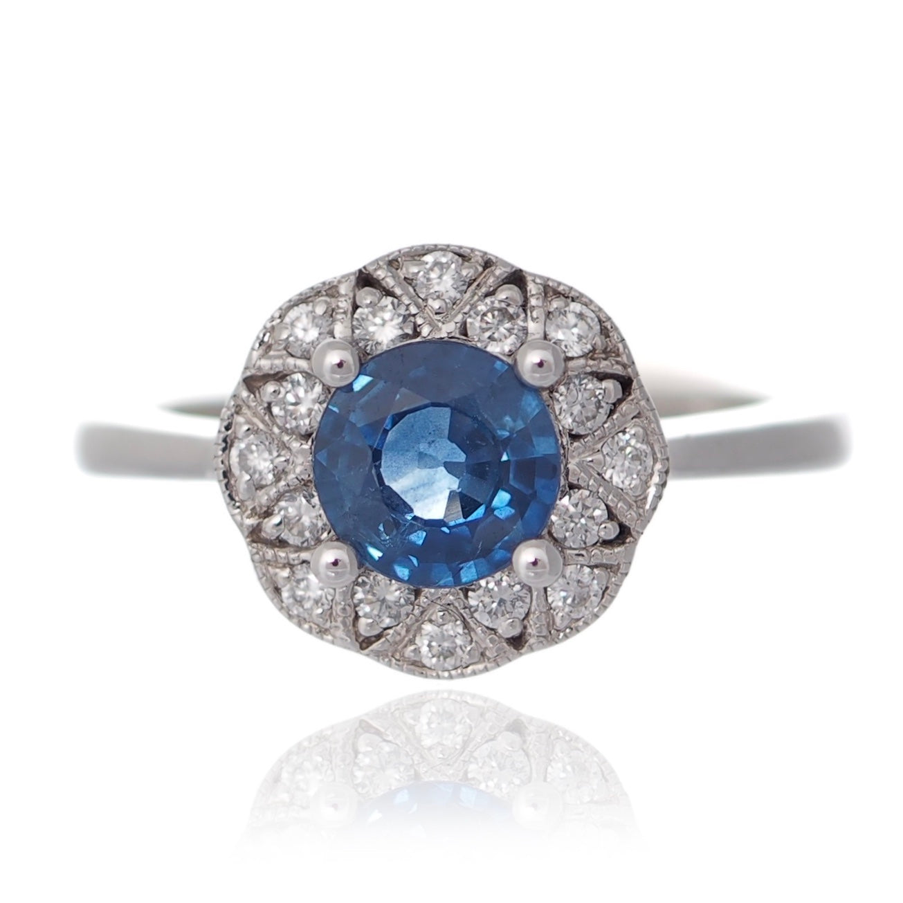 Sapphire and Diamond vintage style engagement ring platinum flower design Fogal and Barnes Harrogate Jewellers