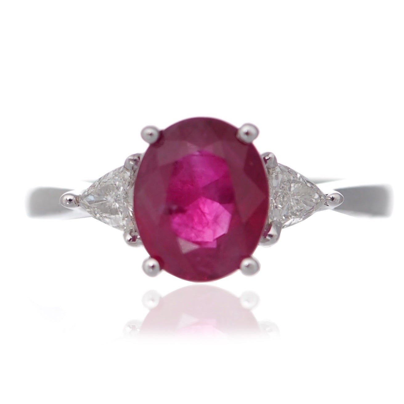 Ruby diamond trilogy engagement ring white gold Harrogate jewellers Fogal and barnes