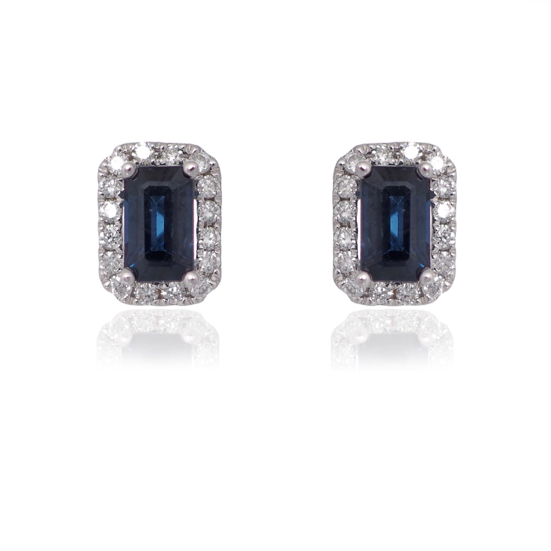 Emerald cut sapphire diamond halo stud earrings white gold Harrogate jewellers Fogal and barnes