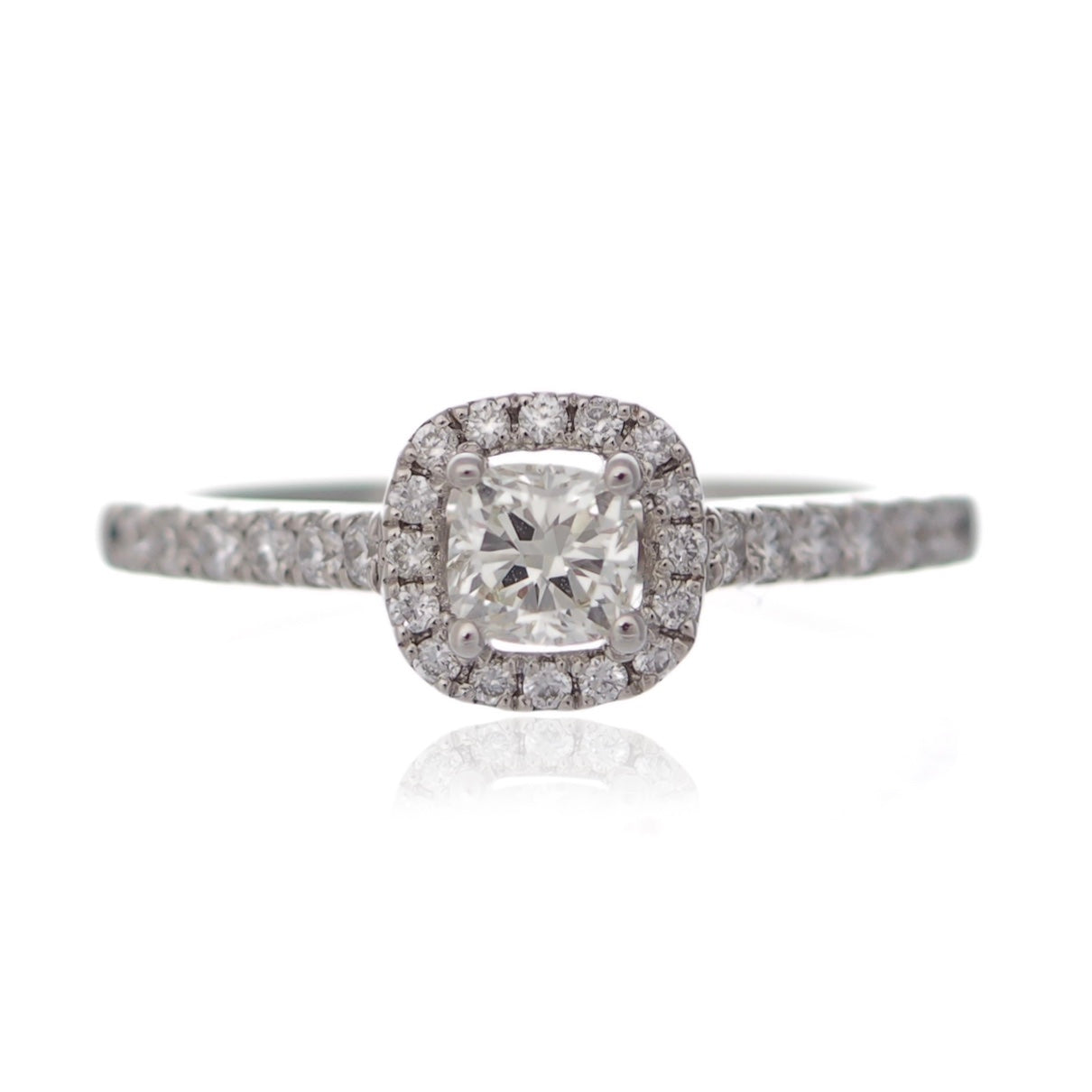 Cushion cut diamond ring halo white gold diamond set shoulders Harrogate jewellers Fogal and barnes