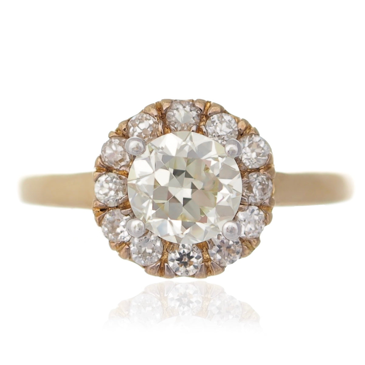 Brilliant round diamond halo engagement ring flower setting yellow gold Harrogate jewellers Fogal and barnes