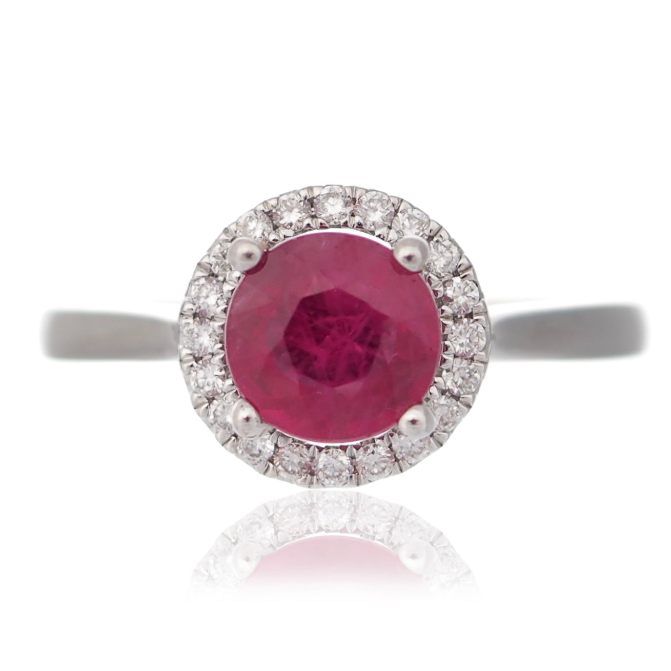 Round Ruby and diamond halo engagement ring yellow gold Harrogate jewellers Fogal and barnes