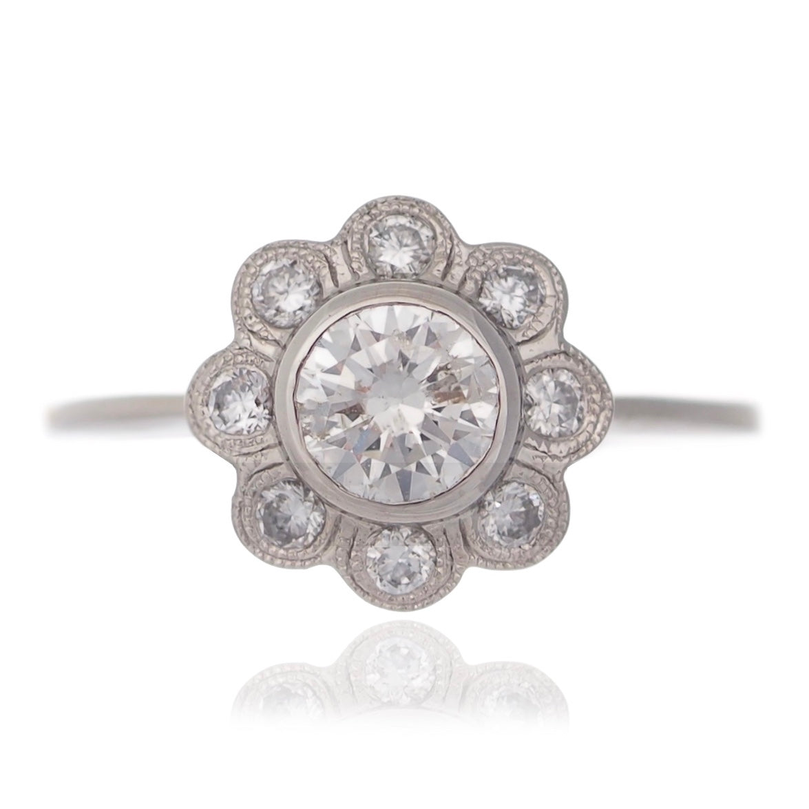 Diamond dress ring vintage inspired flower design Round brilliant diamonds millegraine setting white gold Harrogate jewellers Fogal and barnes