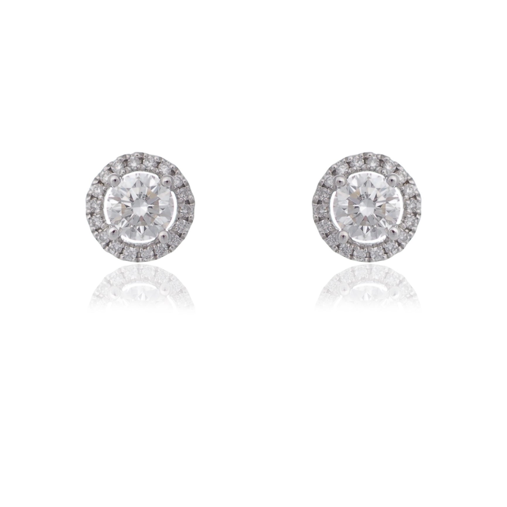 Classic round brilliant cut diamond stud earrings diamond halo white gold Harrogate jewellers Fogal and barnes