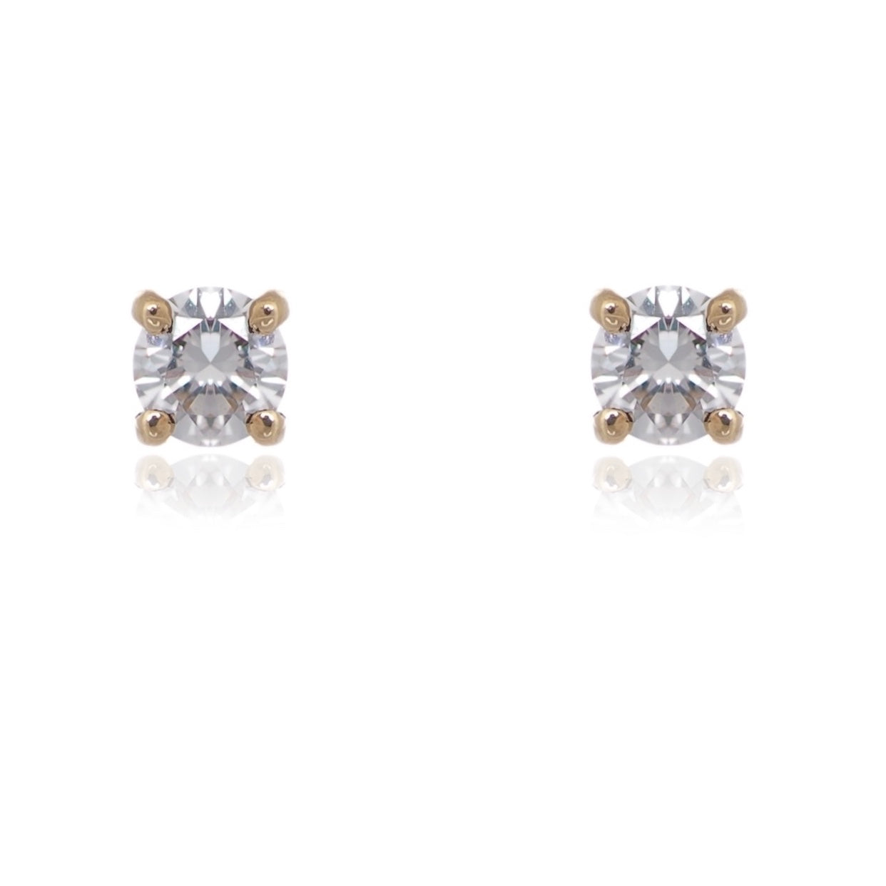 Classic round brilliant diamond stud earrings yellow gold Harrogate jewellers Fogal and barnes