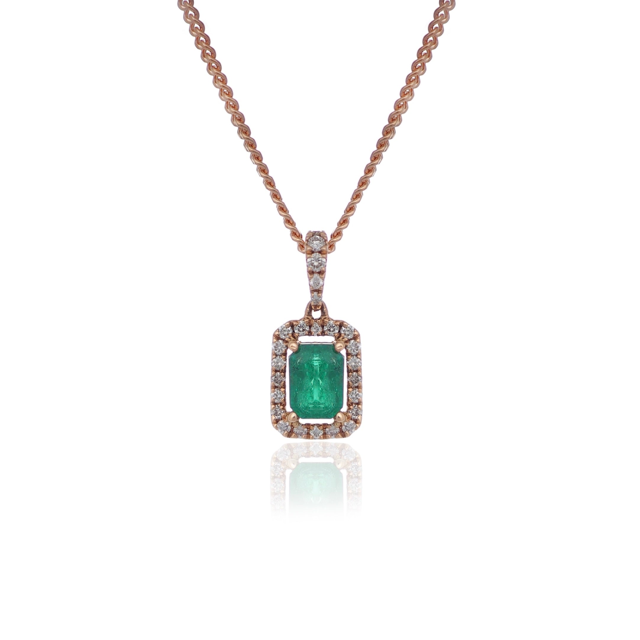 Emerald cut Emerald and diamond Halo drop pendant Yellow gold Harrogate Jewellers Fogal and Barnes