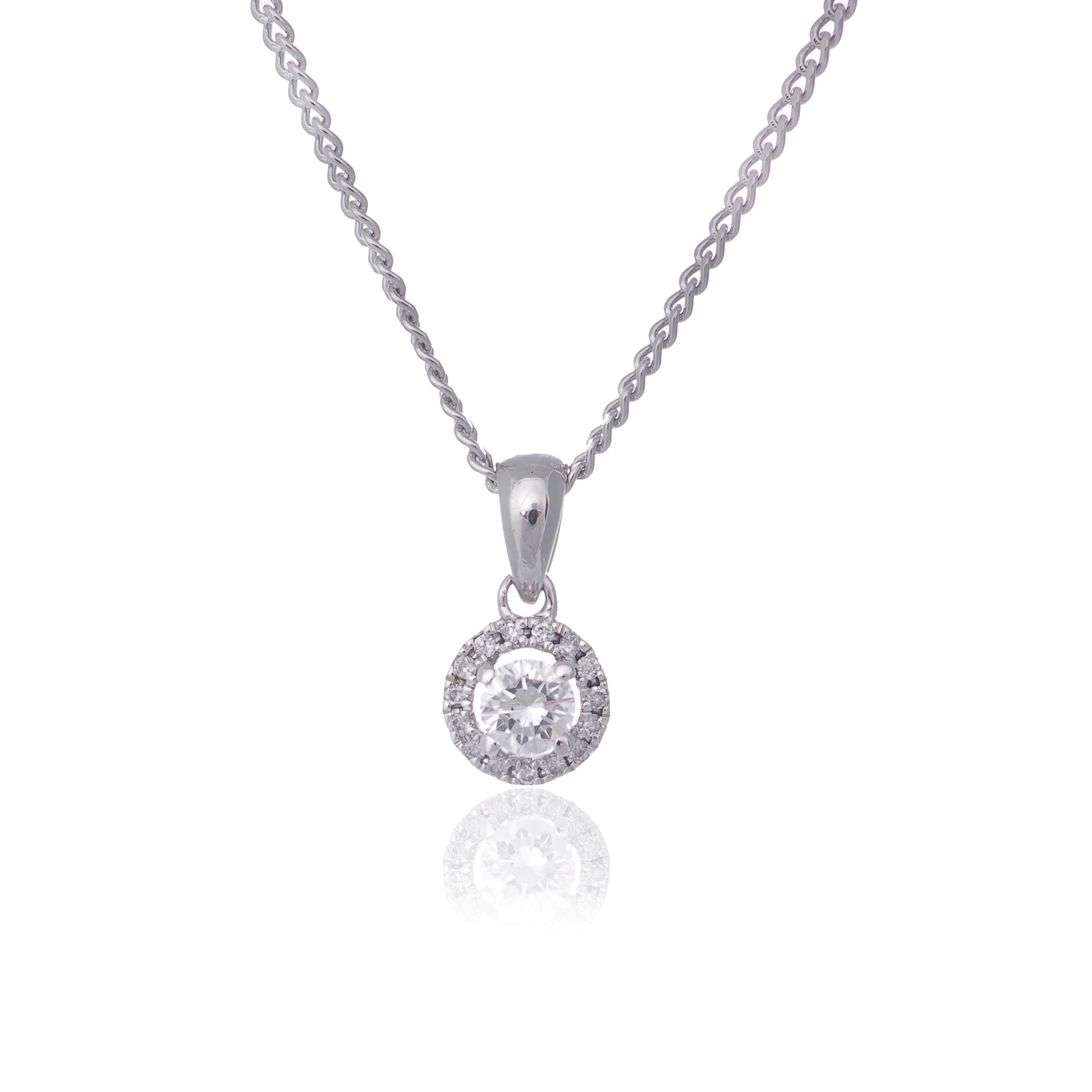 Round brilliant cut diamond with diamond halo pendant necklace white gold Harrogate jewellers Fogal and barnes